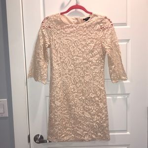 Lined, mini dress. Quarter length sleeves